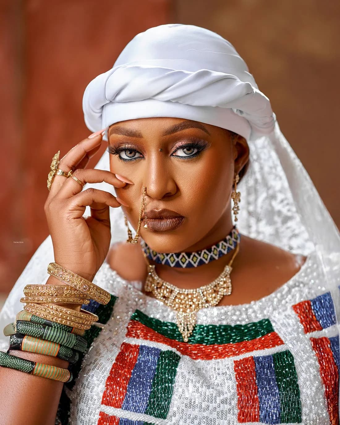 Sefiya Diejomaoh in a white gele and beaded blouse